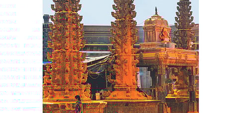 A scene of Khandoba temple immesered in turmeric powder