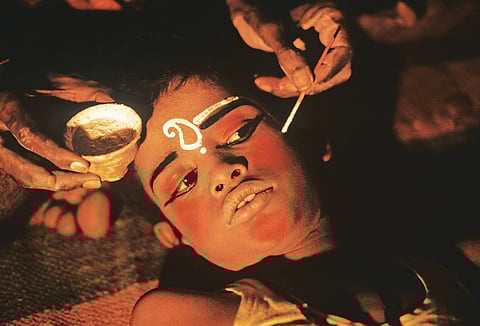 An actor prepares for the day's enactment of the Ramlila