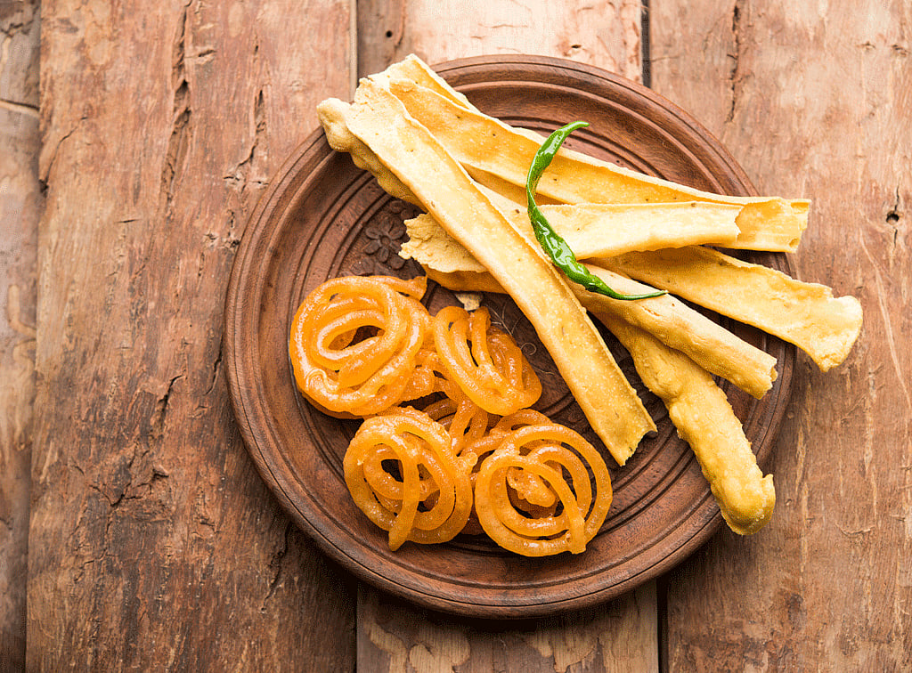Gujaratis eat jalebis with fafda - a unique combination of sweet and savoury