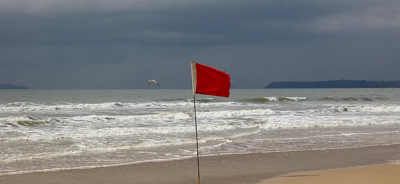 Beaches would have red flags like these to indicate danger zones in monsoon
