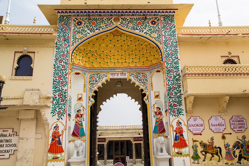 The City Palace in Udaipur stands as a majestic architectural marvel and a testament to the citys regal history. Constructed over centuries, beginning in 1559 by Maharana Udai Singh II, the palace is a fusion of Rajasthani and Mughal architectural styles. Situated on the east bank of Lake Pichola, the palace complex encompasses courtyards, gardens, and intricately designed structures like the Mubarak Mahal and the Jagdish Temple. The breathtaking view of the lake and surrounding hills adds to the palaces allure. Today, the City Palace serves as a museum, showcasing artefacts, royal attire, and historical memorabilia, providing visitors with a glimpse into Udaipurs royal heritage.