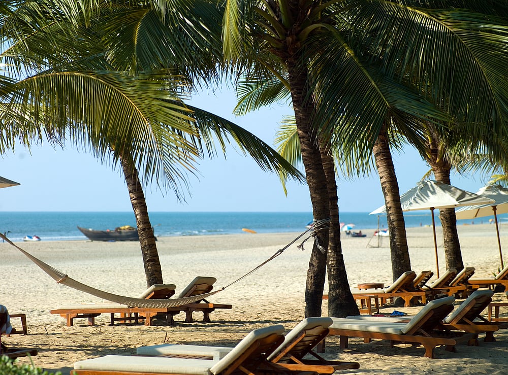 Deck chairs and hammocks outside a beach shack in Palolem