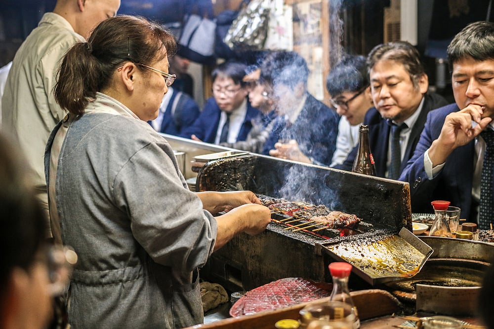 People gather at Izakayas