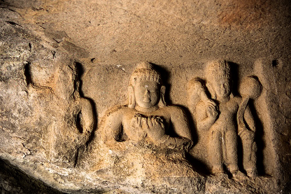 The intricate carvings inside the caves