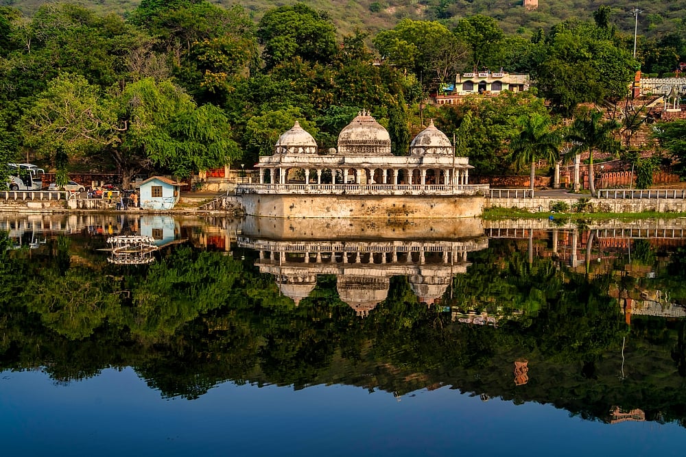 Doodh Talai Lake, situated in Udaipur, is a picturesque artificial lake surrounded by lush gardens and hills. Created by Maharana Fateh Singh, it offers a serene retreat with its tranquil waters and panoramic views of the City Palace, Jag Mandir, and Lake Pichola. The lake is renowned for its musical fountain, which enchants visitors with synchronized water and light displays. Boating is popular, allowing tourists to soak in the scenic beauty. The adjacent Manikya Lal Verma Garden adds to the charm, making Doodh Talai Lake a delightful destination for nature lovers and those seeking a peaceful escape.