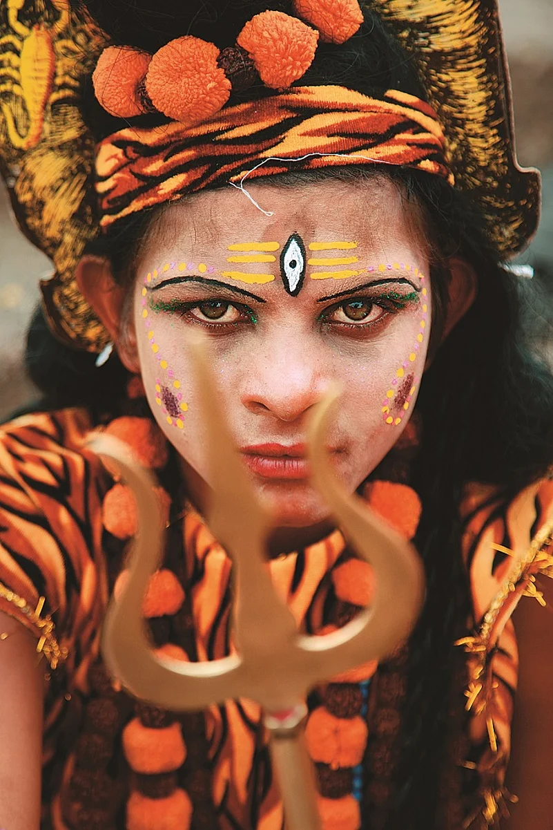 A devotee dressed as Shiva during Kumbh Mela