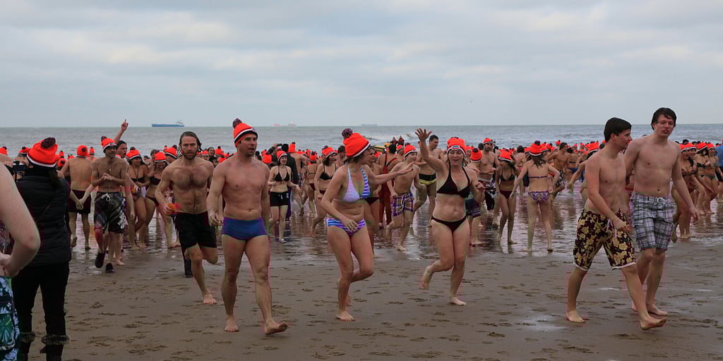 Thousands of Dutch swimmers dive into the North Sea