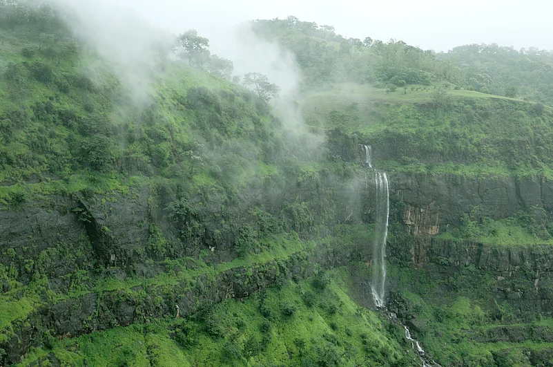 Bhandardhara is known for its lush greenery, waterfalls, and famous Arthur Lake