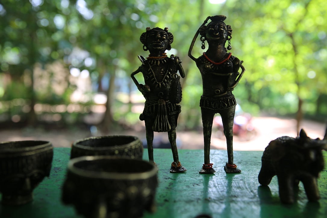 A pair of folk metal figurines, made with the lost wax process, displayed at the festival 
