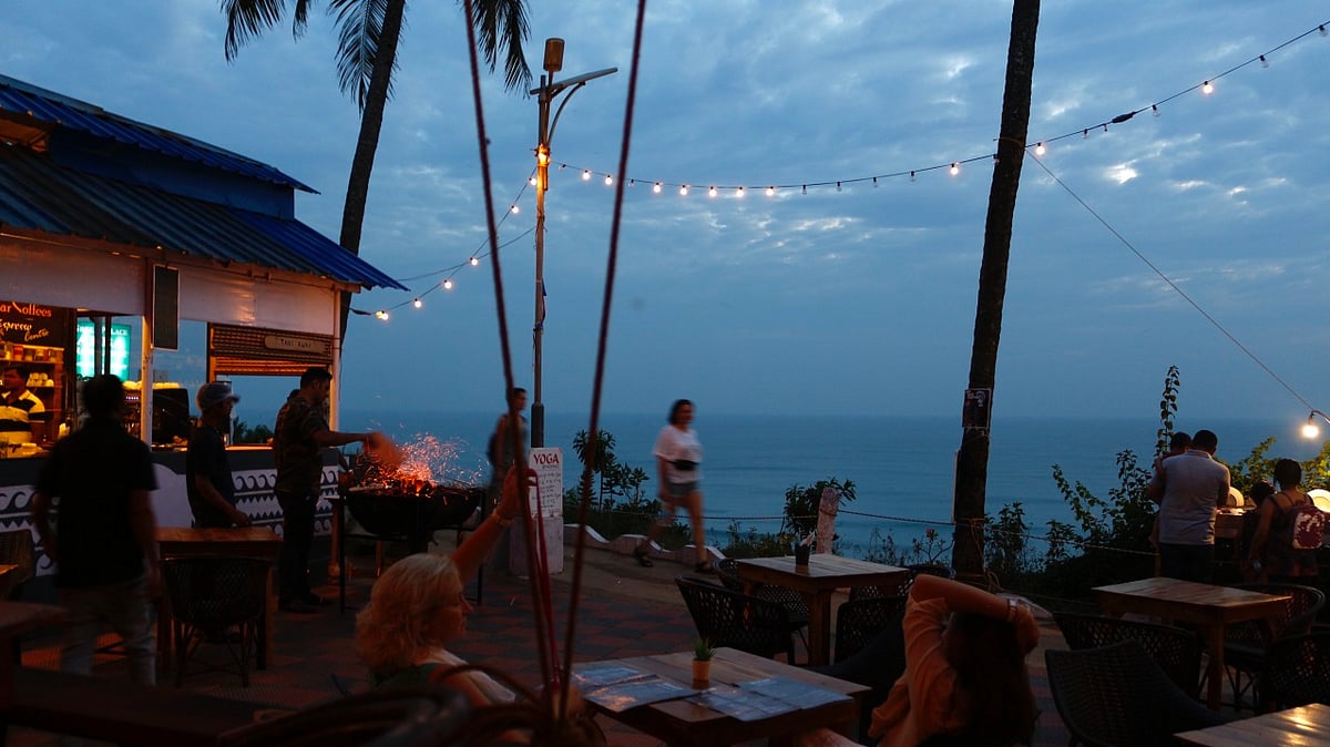 Sipping coconut water and watching dolphins pop up in the deep sea