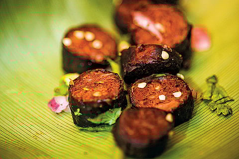 Puhee or spicy blood sausages of the Idu Mishimi tribe, fire-cooked in bamboo hollows