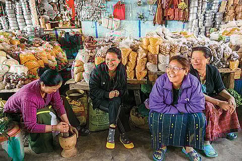Chutney-making and merry-making at the friendly market at Bomdila, a great place to pick up Monpa ingredients such as yak's milk butter, yak's milk cheese, corn, pickles and dry wild foods