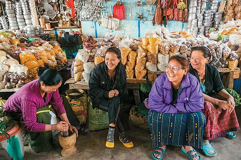 Chutney-making and merry-making at the friendly market at Bomdila, a great place to pick up Monpa ingredients such as yaks milk butter, yaks milk cheese, corn, pickles and dry wild foods
