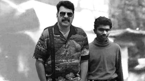 പ്രമോദിന്റെ പഴയൊരു ചിത്രത്തിനൊപ്പം മമ്മൂട്ടിയുടെ ചിത്രം ചേർത്തുവച്ചുണ്ടാക്കിയത്