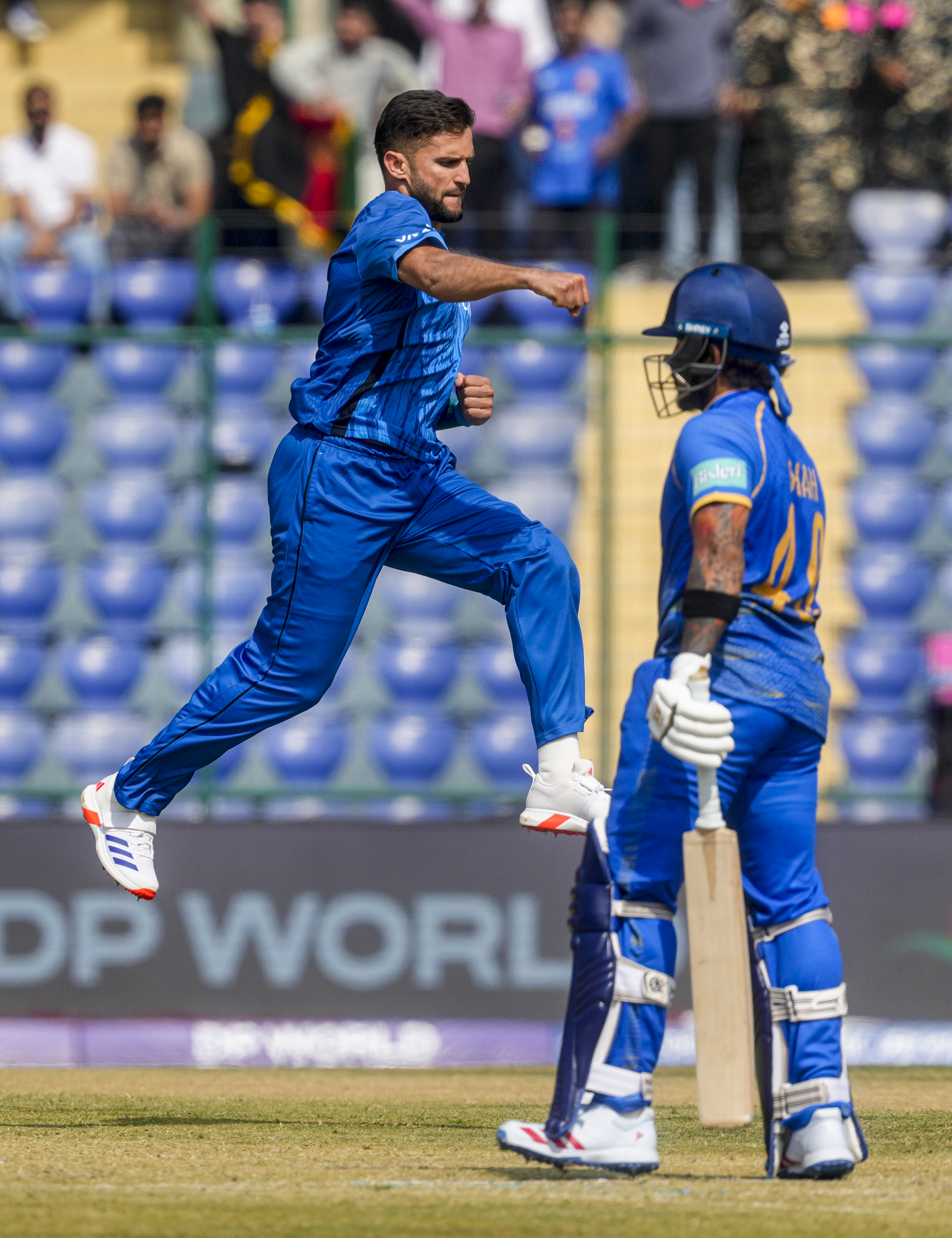 ವಿಕೆಟ್‌ ಪಡೆದ ಸಂಭ್ರಮದಲ್ಲಿ ಅಜ್ಮತ್‌ವುಲ್ಲಾ ಒಮರ್‌ಜೈ –ಪಿಟಿಐ ಚಿತ್ರ