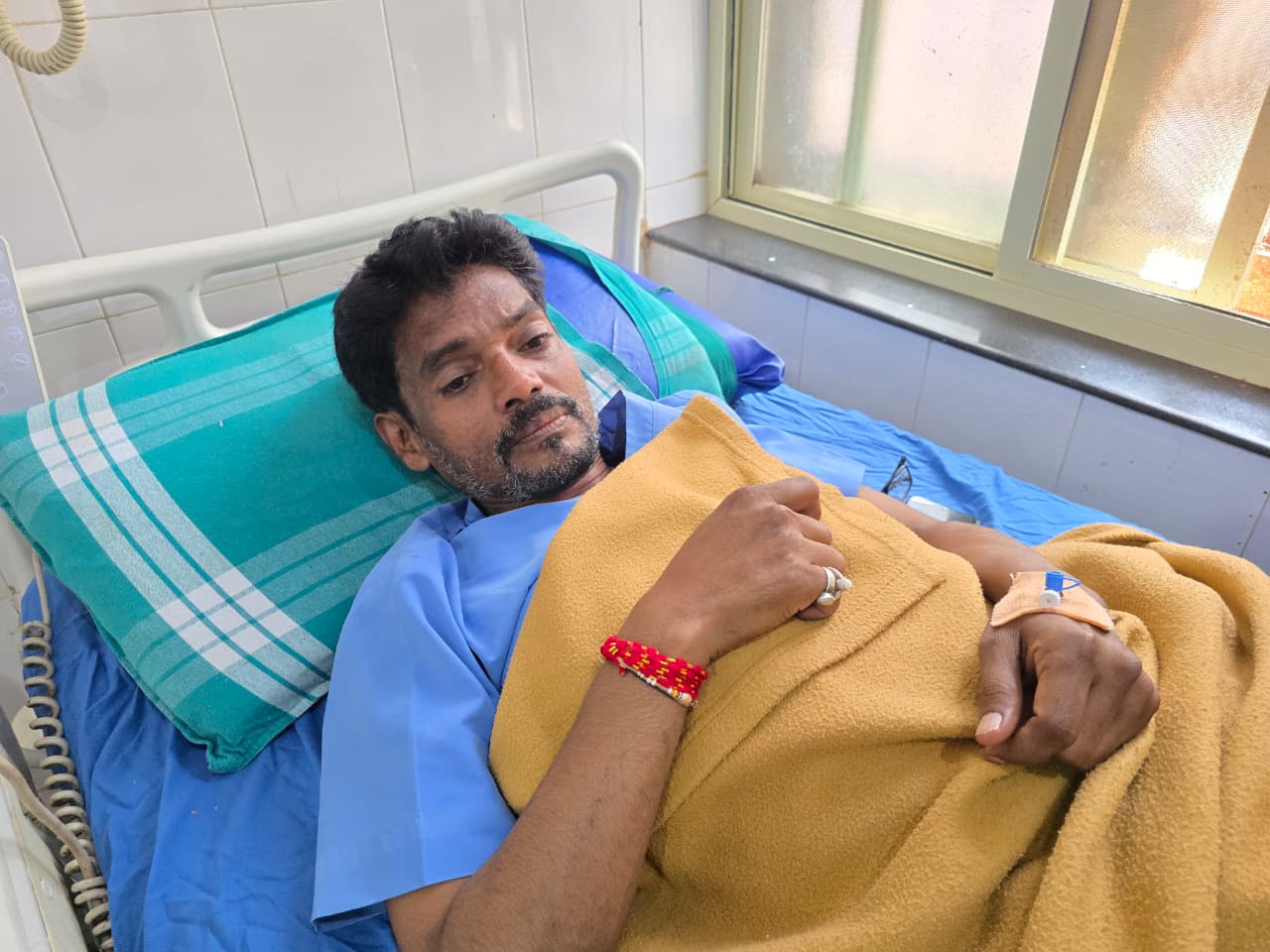 ಗಾಯಗೊಂಡ ನರ್ಸಿಂಗ್‌ ಸಿಬ್ಬಂದಿ ಬಸವರಾಜ ಕಬಾಡಗಿ