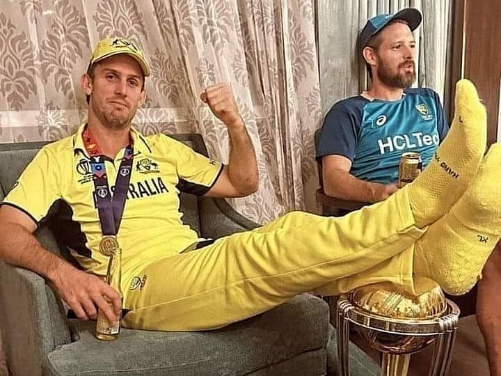 <div class="paragraphs"><p>ಐಸಿಸಿ ಕ್ರಿಕೆಟ್ ವಿಶ್ವಕಪ್ ಟ್ರೋಫಿ ಮೇಲೆ ಕಾಲಿಟ್ಟಿರುವ ಮಿಚೆಲ್ ಮಾರ್ಷ್</p></div>