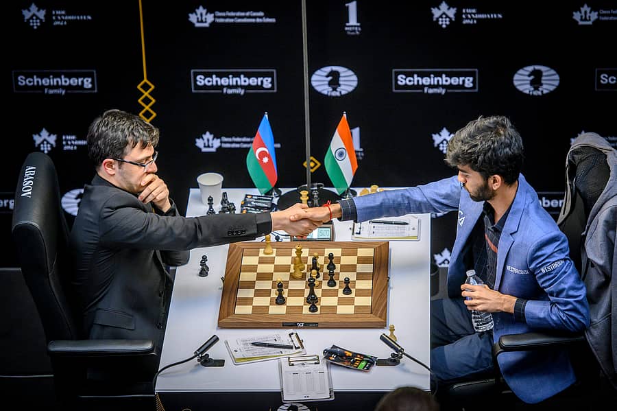 <div class="paragraphs"><p>ಅಜರ್‌ಬೈಜಾನ್‌ನ ನಿಜತ್‌ ಅಬಸೋವ್, ಕ್ಯಾಂಡಿಡೇಟ್ಸ್‌ ಚೆಸ್ ಟೂರ್ನಿಯ 12ನೇ ಸುತ್ತಿನಲ್ಲಿ ತಮ್ಮನ್ನು ಸೋಲಿಸಿದ ದೊಮ್ಮರಾಜು ಗುಕೇಶ್‌ (ಬಲಗಡೆ) ಅವರಿಗೆ ಸಂಪ್ರದಾಯದಂತೆ ಹಸ್ತಲಾಘವ ನೀಡಿದರು.   </p></div>