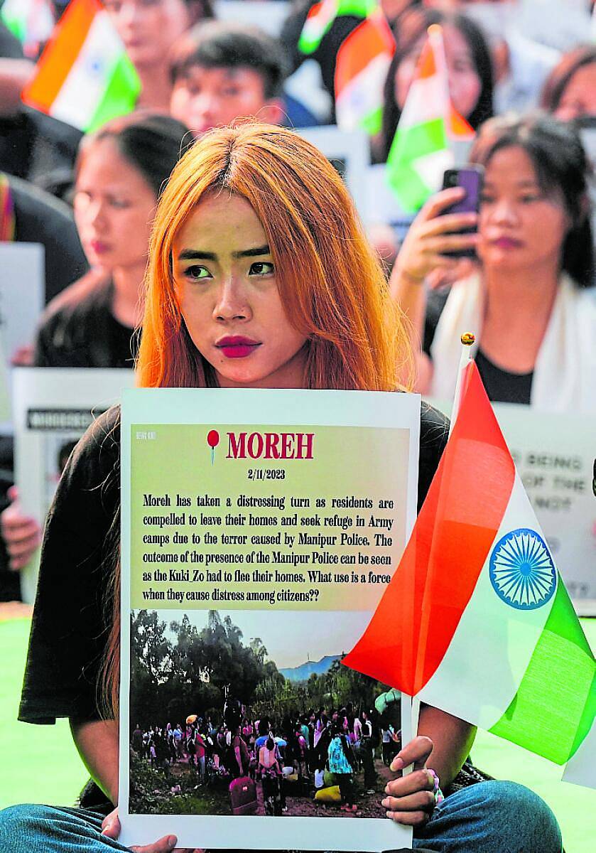 <div class="paragraphs"><p>ಜನಾಂಗೀಯ ಸಂಘರ್ಷವನ್ನು ವಿರೋಧಿಸಿ ಮಣಿಪುರದ ಯುವತಿಯೊಬ್ಬಳು ನವದಹಲಿಯಲ್ಲಿ ಪ್ರತಿಭಟನೆ ನಡೆಸಿದ್ದರು </p></div>