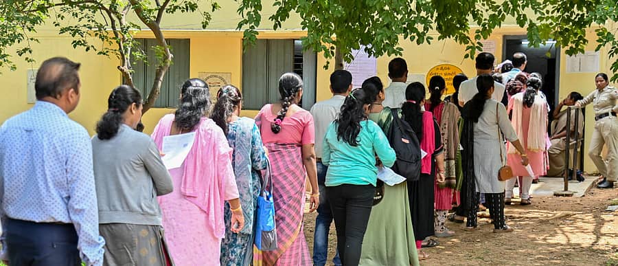 <div class="paragraphs"><p>ಮತದಾನ‌</p></div>