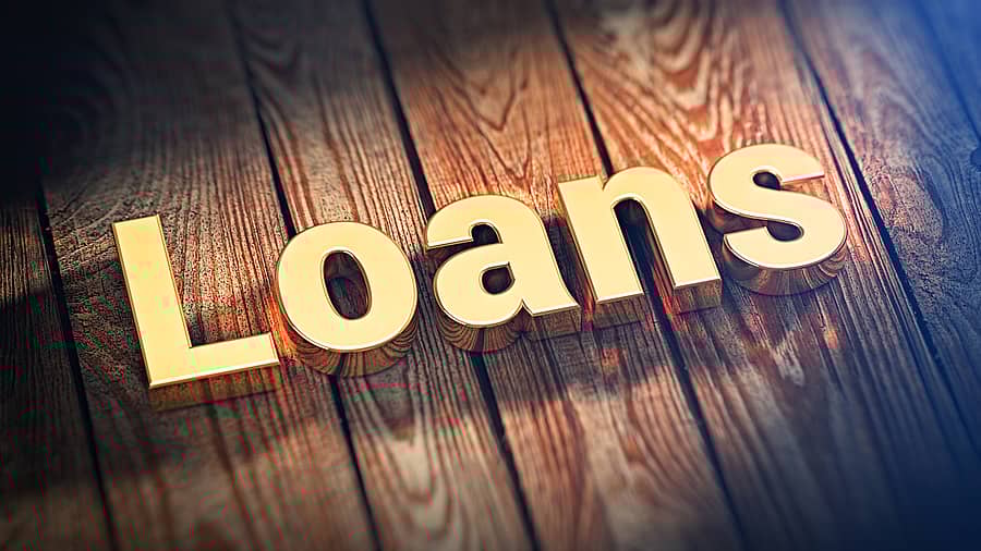 The word "Loans" is lined with gold letters on wooden planks. 3D illustration image
loans