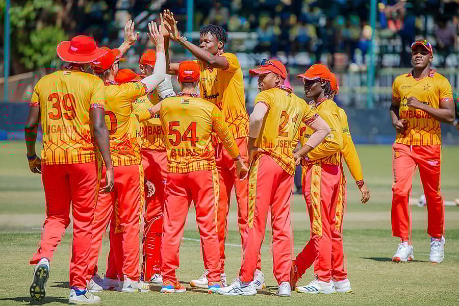 <div class="paragraphs"><p>ಕೀನ್ಯಾ ವಿರುದ್ಧದ ಪಂದ್ಯದಲ್ಲಿ ವಿಕೆಟ್ ಪಡೆದ ಸಂಭ್ರಮದಲ್ಲಿ ಜಿಂಬಾಂಬ್ವೆ ಆಟಗಾರರು</p></div>