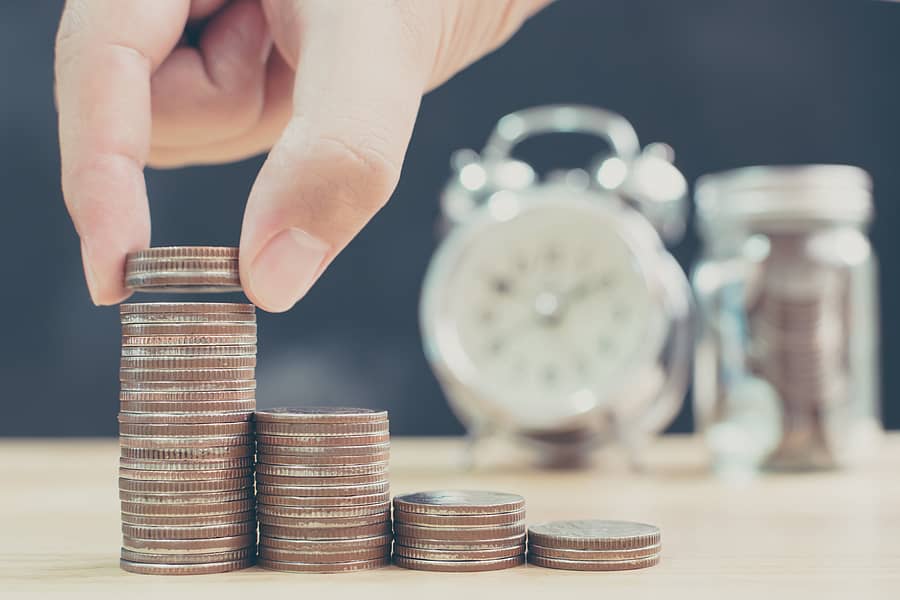 Hand of male or female putting coin stack step up increase save money with blurred clock and jar background, Finance and investment concept
Mutual Funds