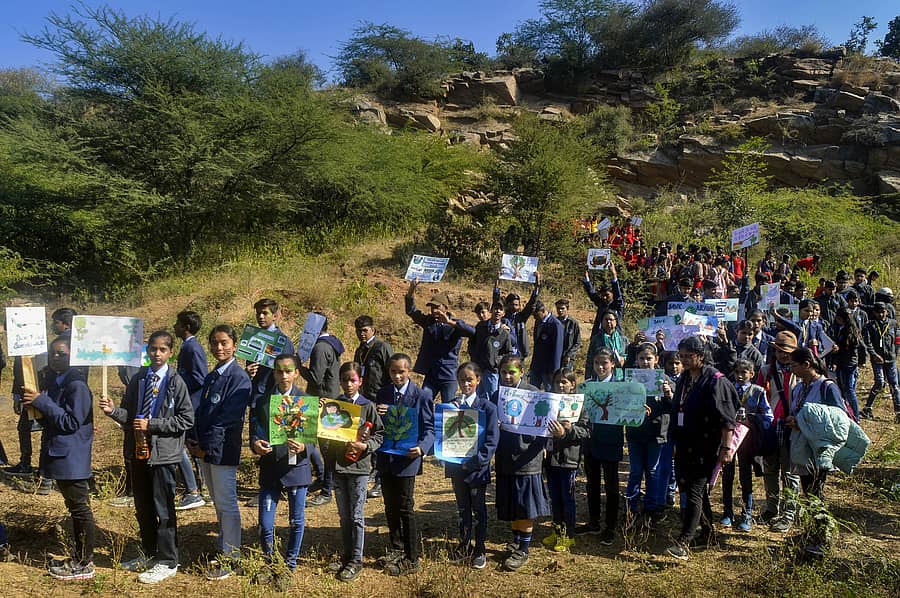 Gurugram: School students take part in a campaign to save Aravali, in Gurugram, Tuesday, Dec. 13, 2022. (PTI Photo) (PTI12_13_2022_000194B)