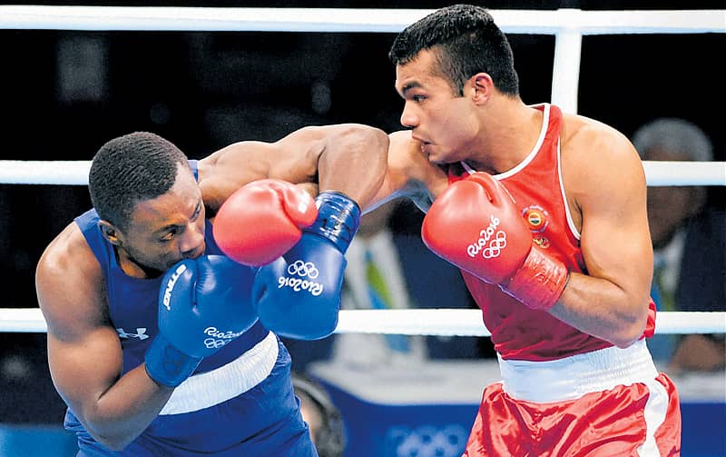 ಭಾರತದ ವಿಕಾಸ್ ಕೃಷ್ಣನ್ (ಕೆಂಪು) ಮತ್ತು ಅಮೆರಿಕದ ಅಲ್ಬರ್ಟ್ ಶೋನ್ ಅವರ ಹಣಾಹಣಿ ಪಿಟಿಐ ಚಿತ್ರ