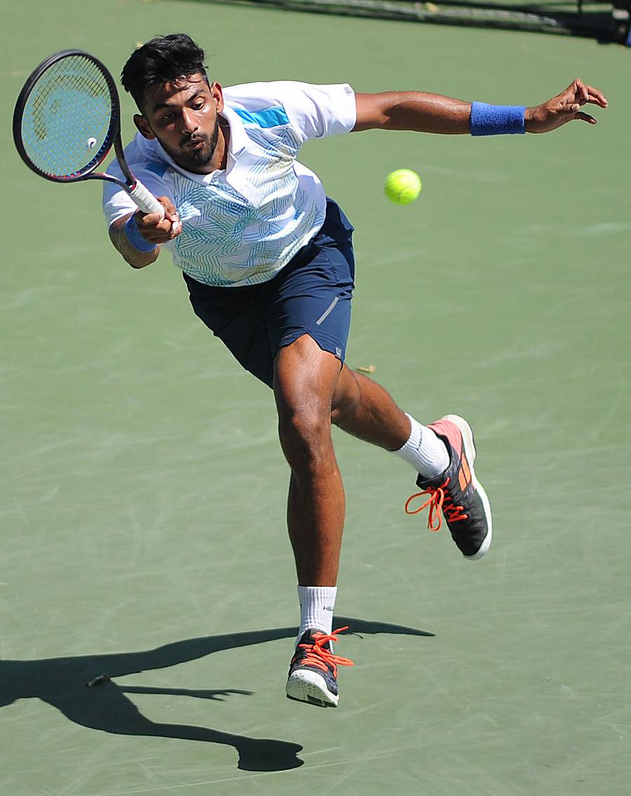 India’s Niki Poonacha in action against Japan’s Yuichi Sugita during the Bengaluru Open Tennis Championship at KSLTA, Bengaluru on Thursday. | Pushkar V