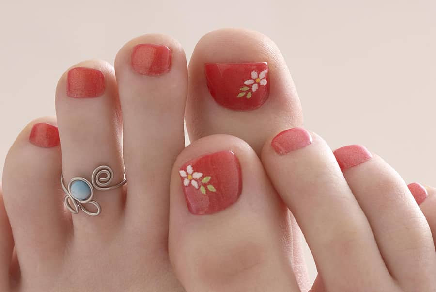 A pair of perfectly pedicured toes.Perfectly Pedicured