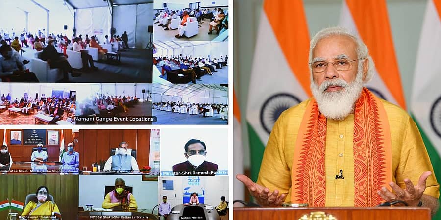ಪ್ರಧಾನಿ ನರೇಂದ್ರ ಮೋದಿ ಅವರು ವಿಡಿಯೊ ಕಾನ್ಫರೆನ್ಸ್ ಮೂಲಕ ನಮಾಮಿ ಗಂಗೆ ಅಭಿವೃದ್ಧಿ ಯೋಜನೆಗೆ ಮಂಗಳವಾರ ಚಾಲನೆ ನೀಡಿ ಮಾತನಾಡಿದರು –ಪಿಟಿಐ ಚಿತ್ರ