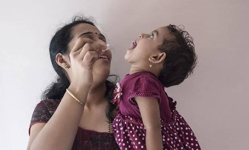 ಮಗುವಿಗೆ ಊಟ ಮಾಡಿಸುತ್ತಿರುವ ತಾಯಿ - ಪ್ರಾತಿನಿಧಿಕ ಚಿತ್ರ (Getty Images)