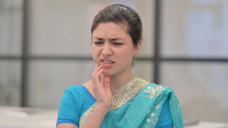Portrait of Sick Young Indian Woman having Toothache Portrait of Sick Indian Woman having Toothache