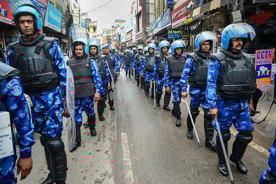 ರ‍್ಯಾಪಿಡ್‌ ಆ್ಯಕ್ಷನ್‌ ಫೋರ್ಸ್‌ (ಆರ್‌ಎಎಫ್‌) ಸಿಬ್ಬಂದಿ ಸೋಮವಾರ ಜಲಂಧರ್‌ನಲ್ಲಿ ಪಥ ಸಂಚಲನ ನಡೆಸಿದರು –ಪಿಟಿಐ ಚಿತ್ರ 