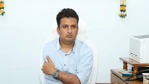 Alt="PS Girisha (IAS)"