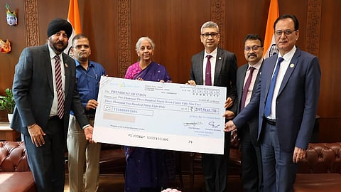 Canara Bank hands over Rs 2,397 crore dividend cheque to Govt for FY26