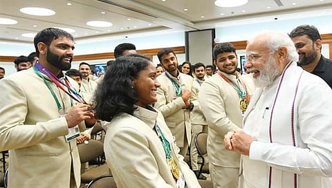 PM Modi interacts with Thomas Champions