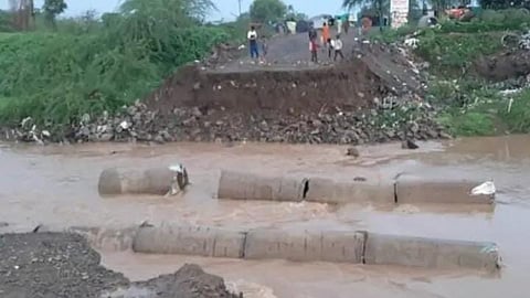 The bridge was washed away