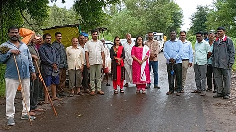Officials inspecting canal feet