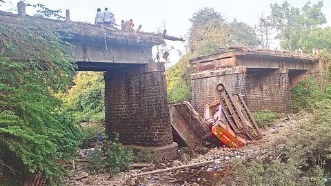 Poclain Machine Falls in River