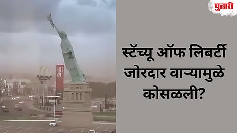 statue of liberty replica fallen down