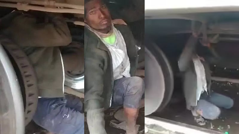 பணமில்லை என ரயில் சக்கரங்களுக்கு நடுவே 250 கி.மீ தூரம் பயணித்த மத்தியப் பிரதேச நபர் / man travelled 250 km between train wheels in mp