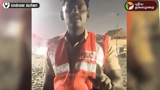 மெரினா கடற்கரையில் பெண்ணை மிரட்டிய காவலர் வீடியோ வைரல்Video of policeman threatening woman at Marina beach goes viral