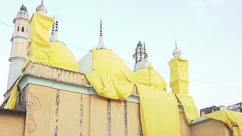 masjid mosques covered plastic sheets holi procession uttar pradesh