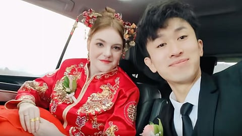 China delivery man tells US teacher with I love you in lift marries her 5 months later