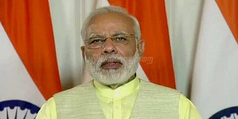 அனைத்து பிரச்னைகளையும் பேசி தீர்க்க முடியும்: பிரதமர் மோடி
