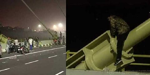 உயிரை பணயம் வைத்து பாலத்தில் செல்பி!