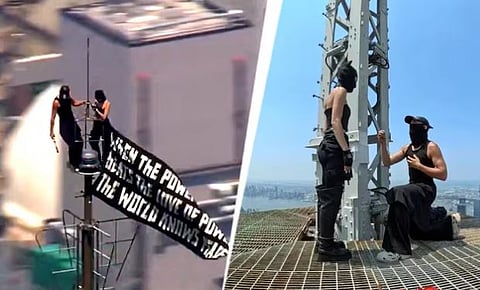 Russian couple climbing the Empire State Building 