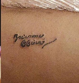 'Nattamai kudumbam' tattoo.
